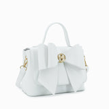Vegan leather crossbody in white, bow satchel bag, designer vegan handbags, women's spring purses, bow front handbag, gold hardware crossbody, eco-friendly satchel, Zoey bag.
ooh la la! in Grapevine TX 76051