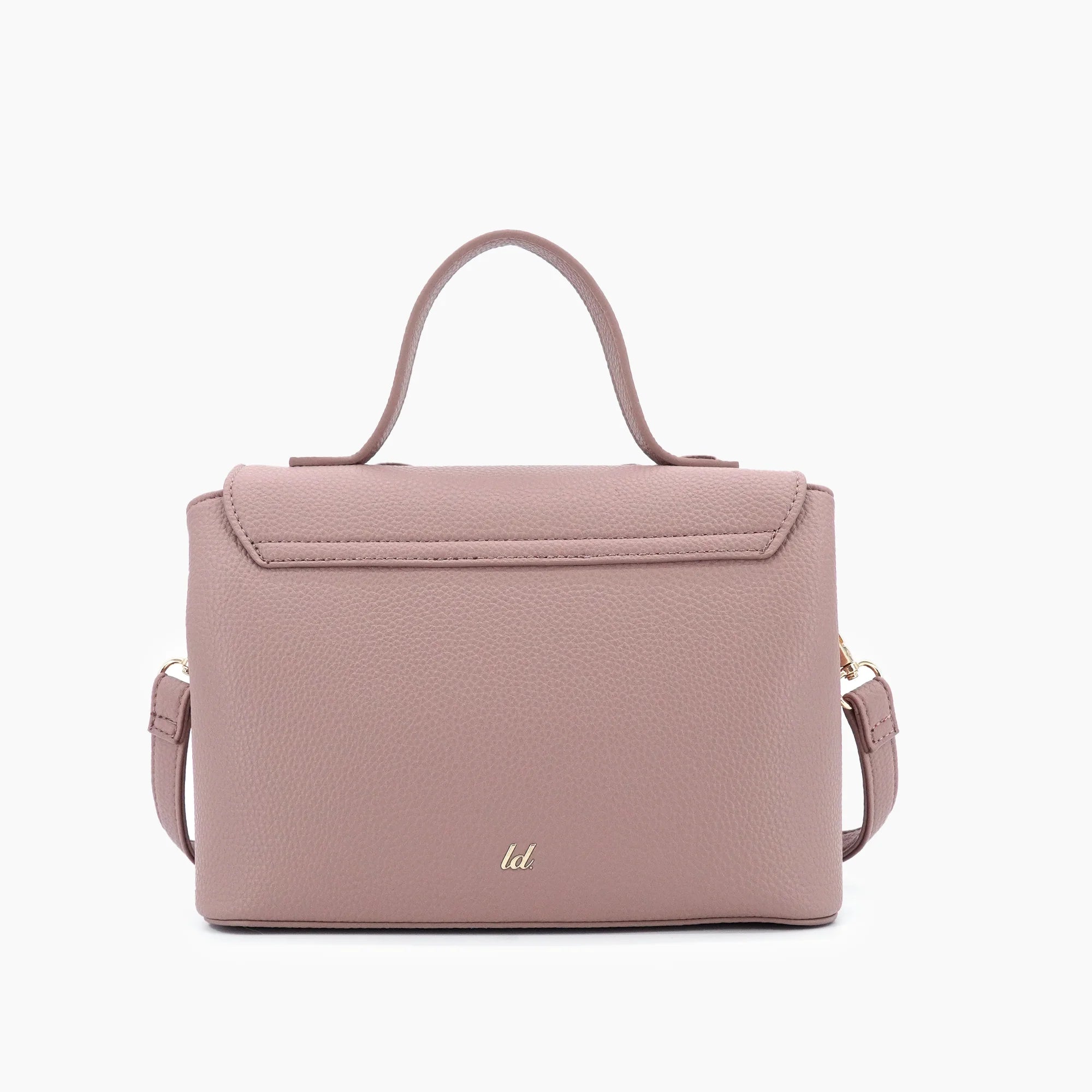Vegan leather crossbody in blush, bow satchel bag, designer vegan handbags, women's spring purses, bow front handbag, gold hardware crossbody, eco-friendly satchel, Zoey bag.
ooh la la! in Grapevine TX 76051