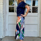 Satin Horse Printed Midi Skirt in navy at ooh la la! in Grapevine TX 76051