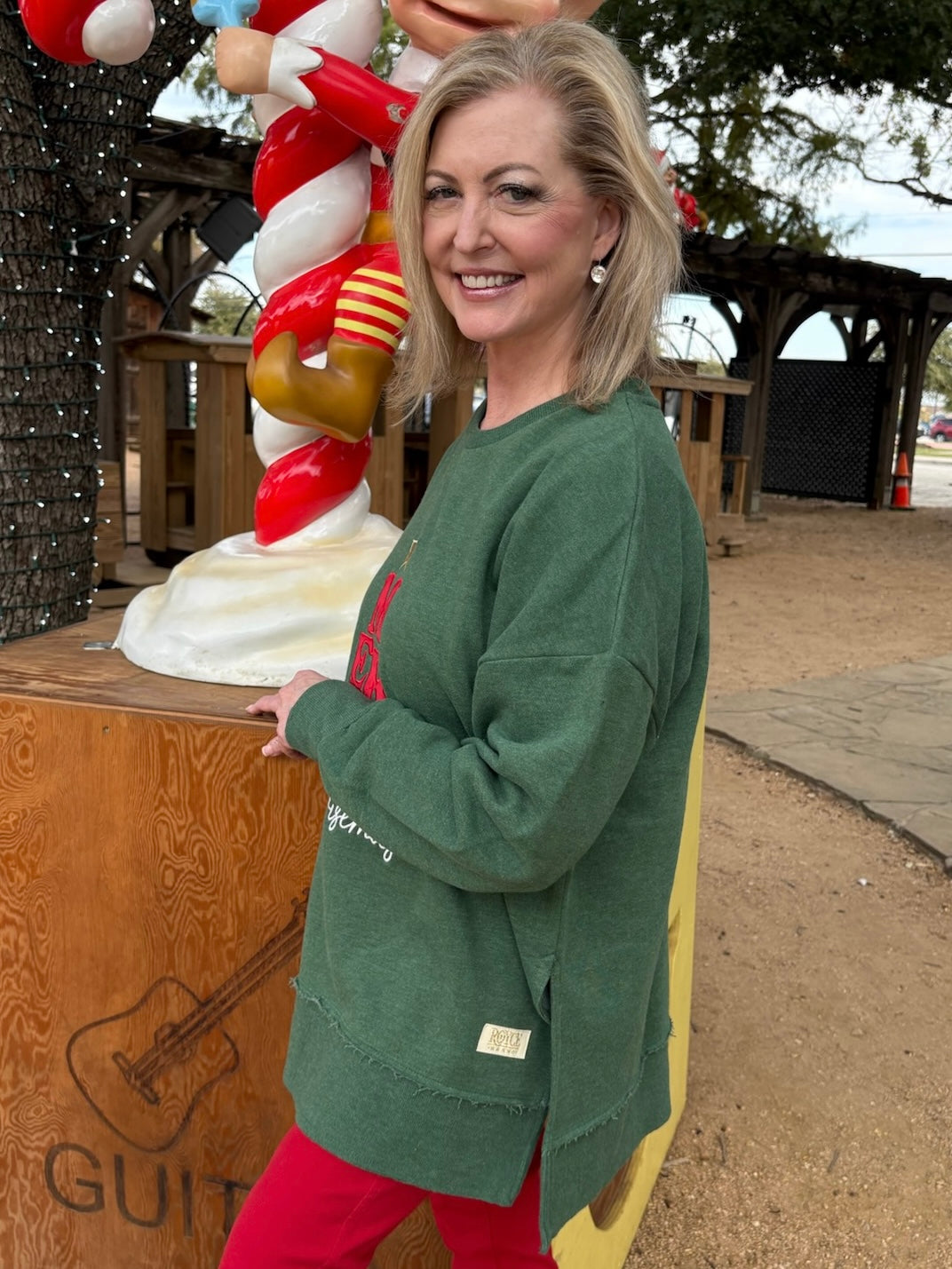 Merry Tree Appliquéd Sweatshirt In green at ooh la la! In grapevine TX 76051