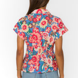 floral peplum blouse, women's short sleeve shirt, smocked back top, lyocell floral shirt, pleated waist blouse, spring floral top, Peri Spring Garden shirt, feminine button-down blouse at ooh la la! in Grapevine TX 76051
