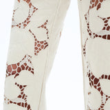 off white floral cutout jeans, embroidered straight leg pants, women's cream denim, high rise relaxed jeans, boho lace pants, luxury embroidered denim, off white floral trousers at ooh la la in Grapevine TX 76051