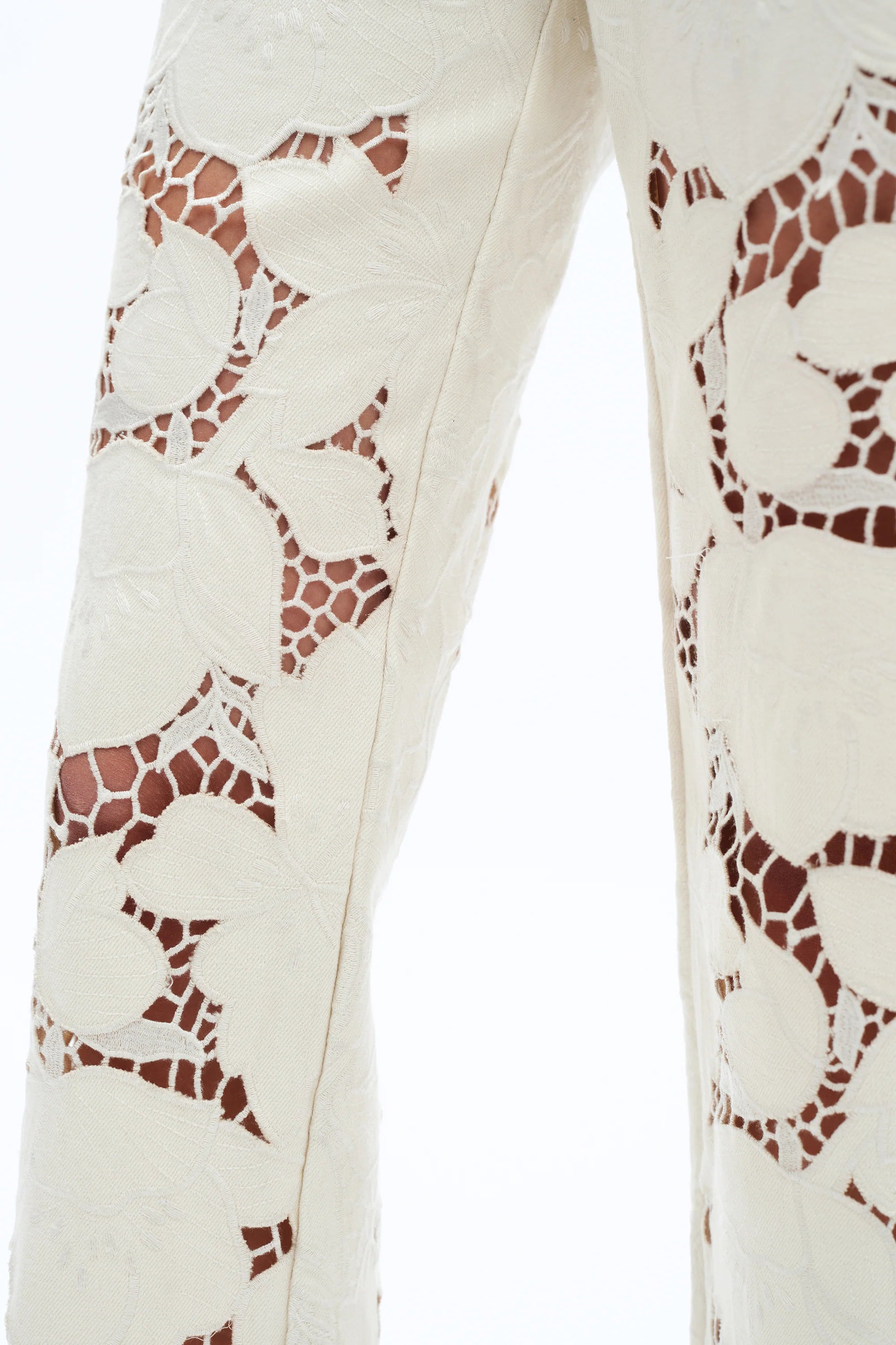 off white floral cutout jeans, embroidered straight leg pants, women's cream denim, high rise relaxed jeans, boho lace pants, luxury embroidered denim, off white floral trousers at ooh la la in Grapevine TX 76051
