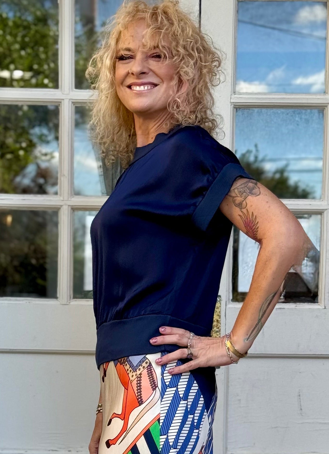 Satin Short Sleeve Top with Rib Knit Trim in navy at ooh la la! in Grapevine TX 76051