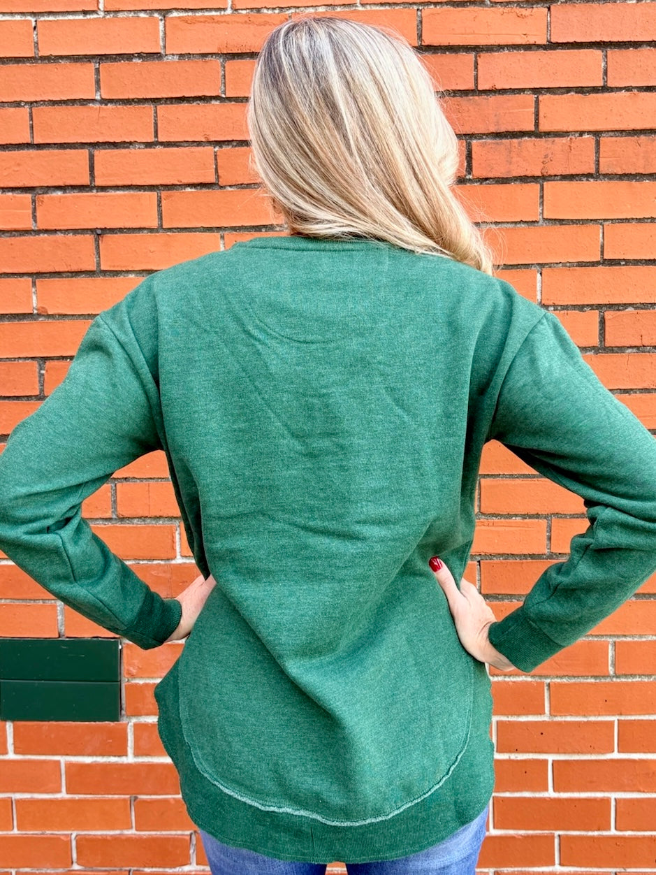 Christmas Joy Quilted Applique Rounded Bottom Sweatshirt in green at ooh la la! in Grapevine TX 76051