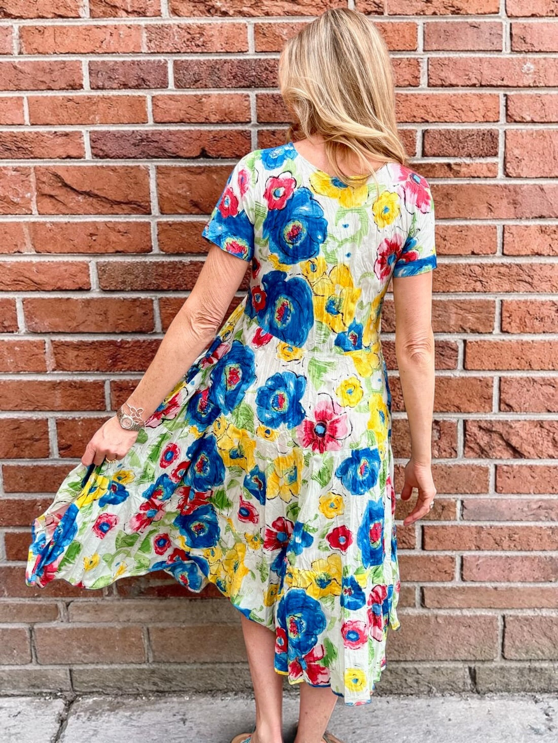 Dress Addict Jazy, organic cotton midi dress, multi color floral dress with pockets, sustainable summer dress, bias cut v-neck dress, women's tiered floral midi, travel-friendly crinkle dress. at ooh la la! in Grapevine TX 76051