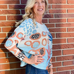 Abstract Pink & Blue Batwing Sweater at ooh la la! in Grapevine TX 76051