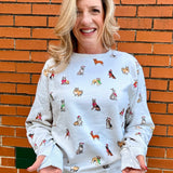 Holiday Dogs on Repeat Sweatshirt at ooh la la! In Grapevine TX 76051