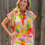 Flamingo Abstract Cap Slv Hi Lo Top at ooh la la! in Grapevine TX 76051