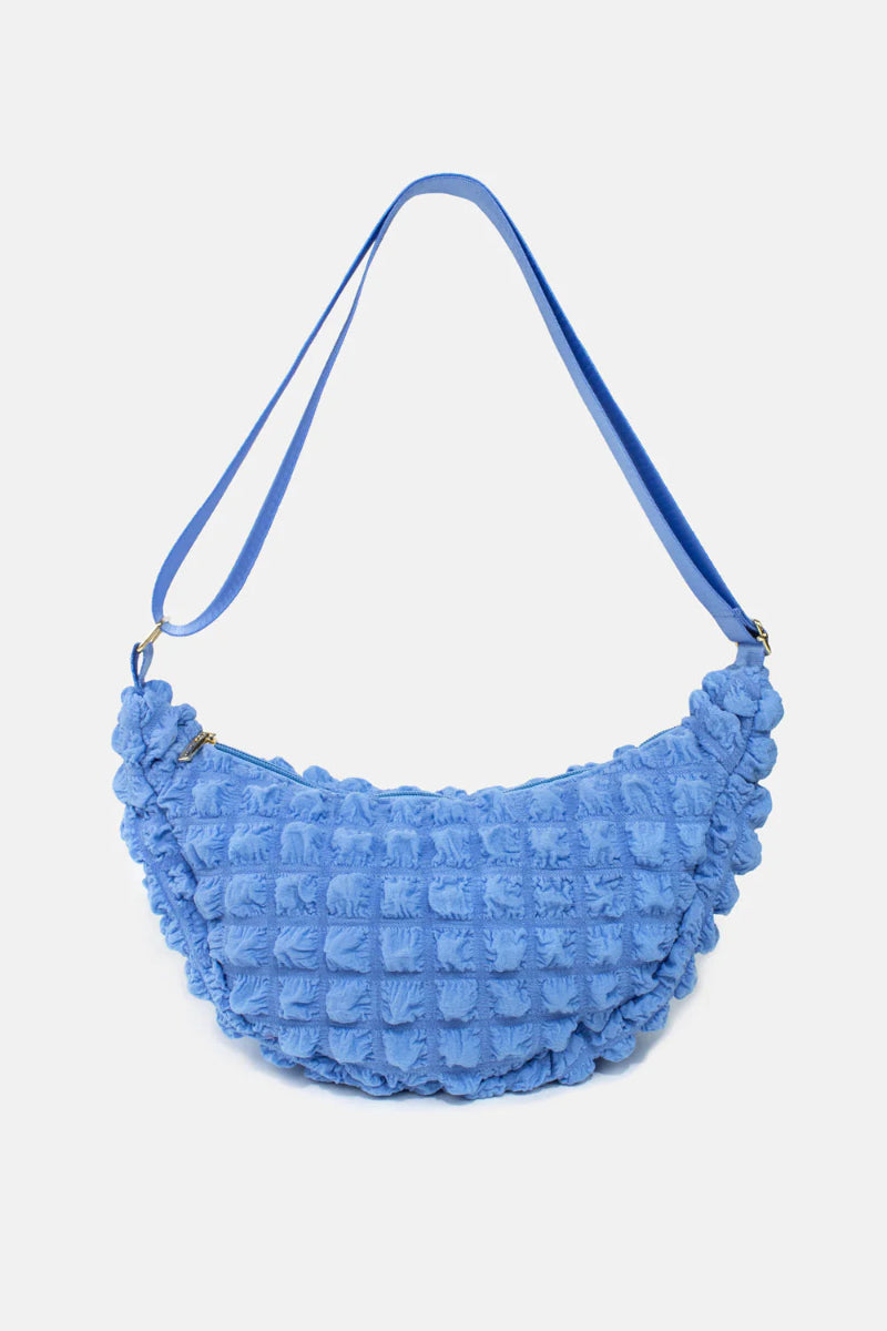 Kind Bag London - Puff Crescent Crossbody Bag in blue at ooh la la! in Grapevine TX 76051