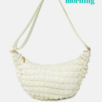 Kind Bag London - Puff Crescent Crossbody Bag in cream at ooh la la! in Grapevine TX 76051