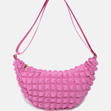 Kind Bag London - Puff Crescent Crossbody Bag in pink at ooh la la! in Grapevine TX 76051