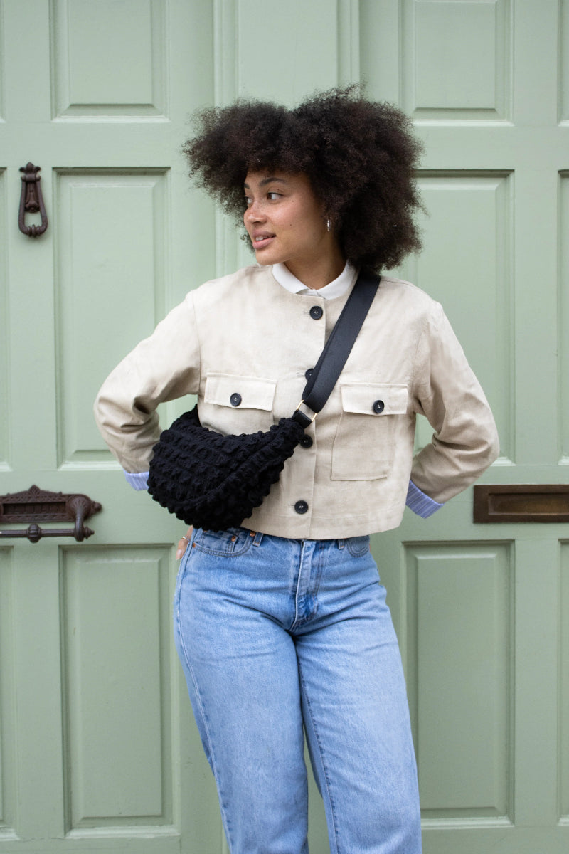 Kind Bag London - Puff Crescent Crossbody Bag in black at ooh la la! in Grapevine TX 76051