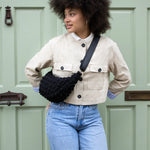 Kind Bag London - Puff Crescent Crossbody Bag in black at ooh la la! in Grapevine TX 76051
