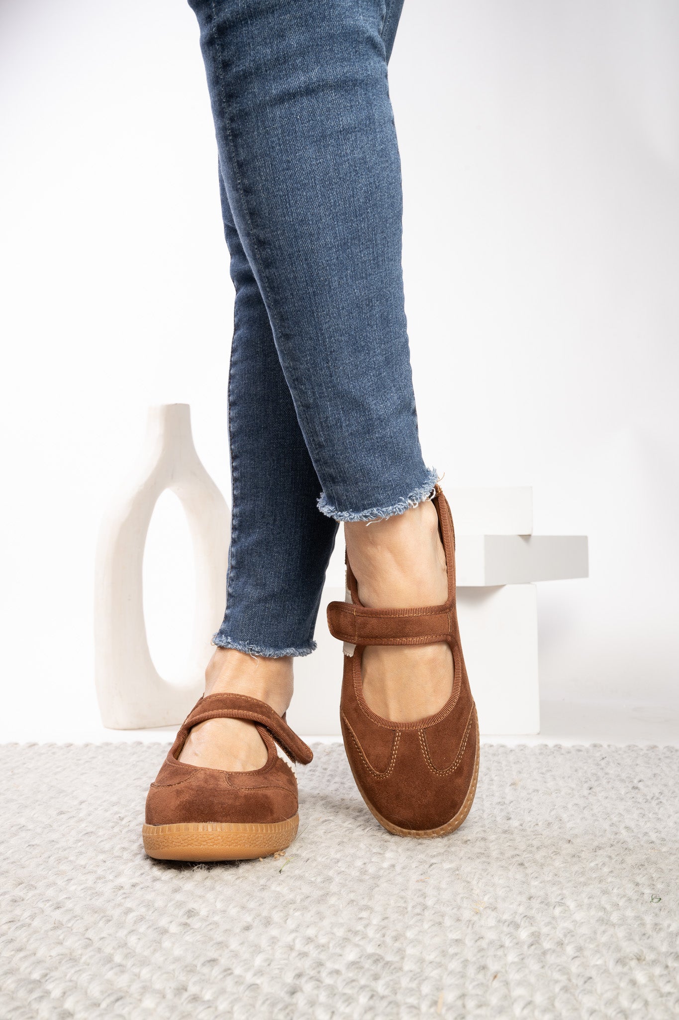 Corky's Calm Down Maryjane Sneaker in chestnut brown suede with gum sole, worn with jeans at ooh la la! in Grapevine TX 76051
