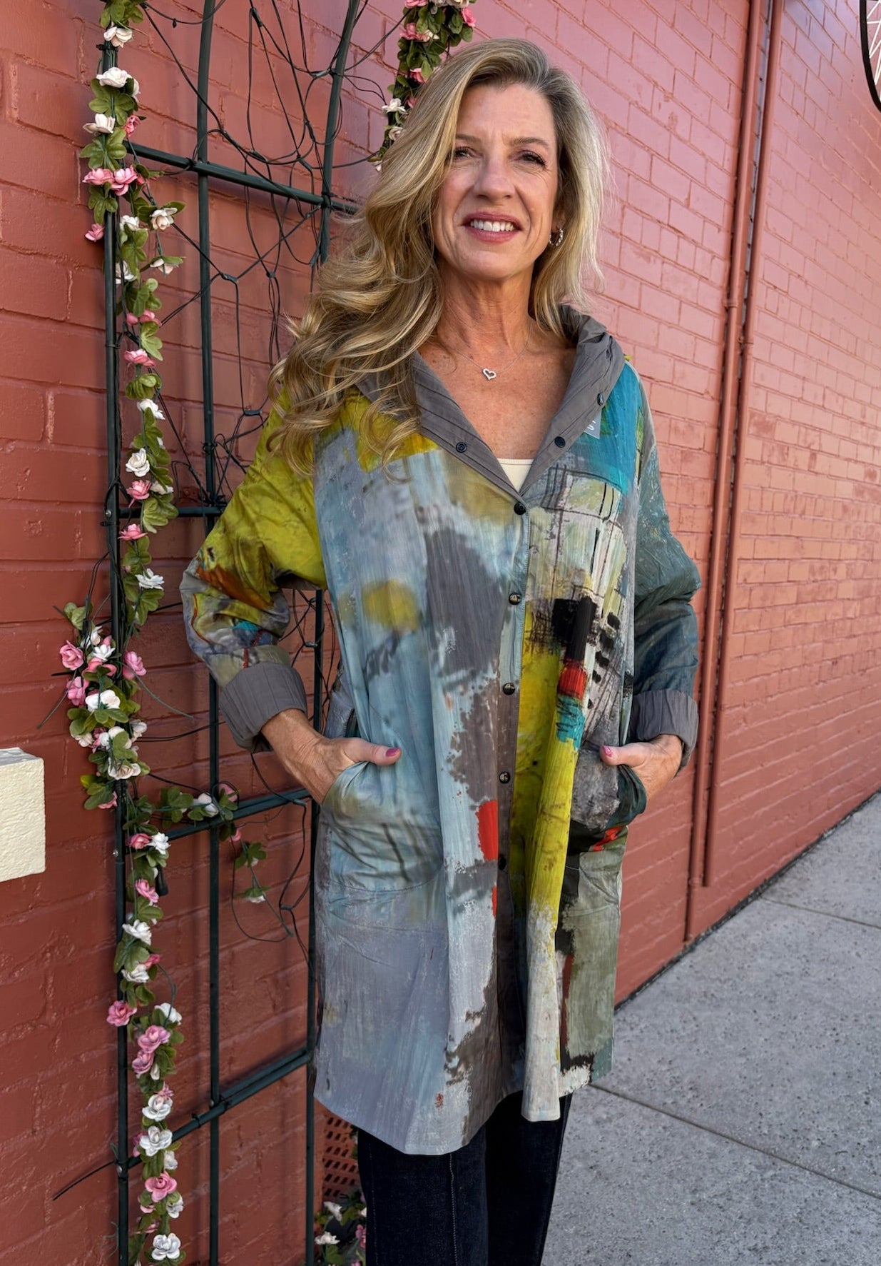 Reversible Hooded Rain Coat In multi blocks/taupe at ooh la la! in Grapevine TX 76051