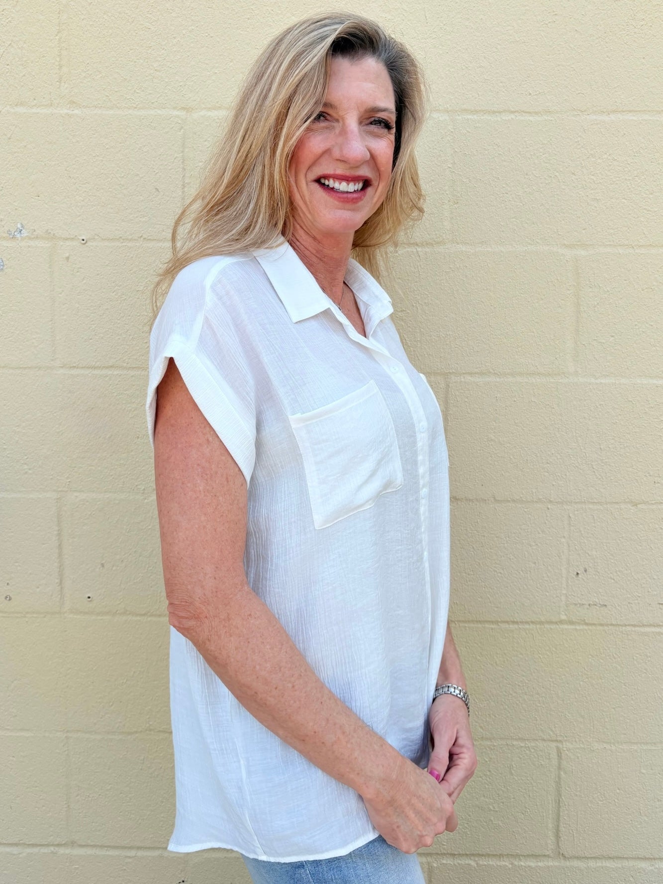 White oversized blouse, sleeveless button down, women's gauze shirt, relaxed fit summer top, drop shoulder blouse, breathable white shirt, chic sleeveless blouse. at ooh la la! in Grapevine TX 76051
