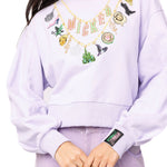 Wicked X Queen of Sparkles Lavender Wicked Charm Necklace Sweatshirt at ooh la la! in Grapevine TX 76051