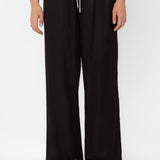 Black satin wide-leg drawstring pants with cream tie on female model