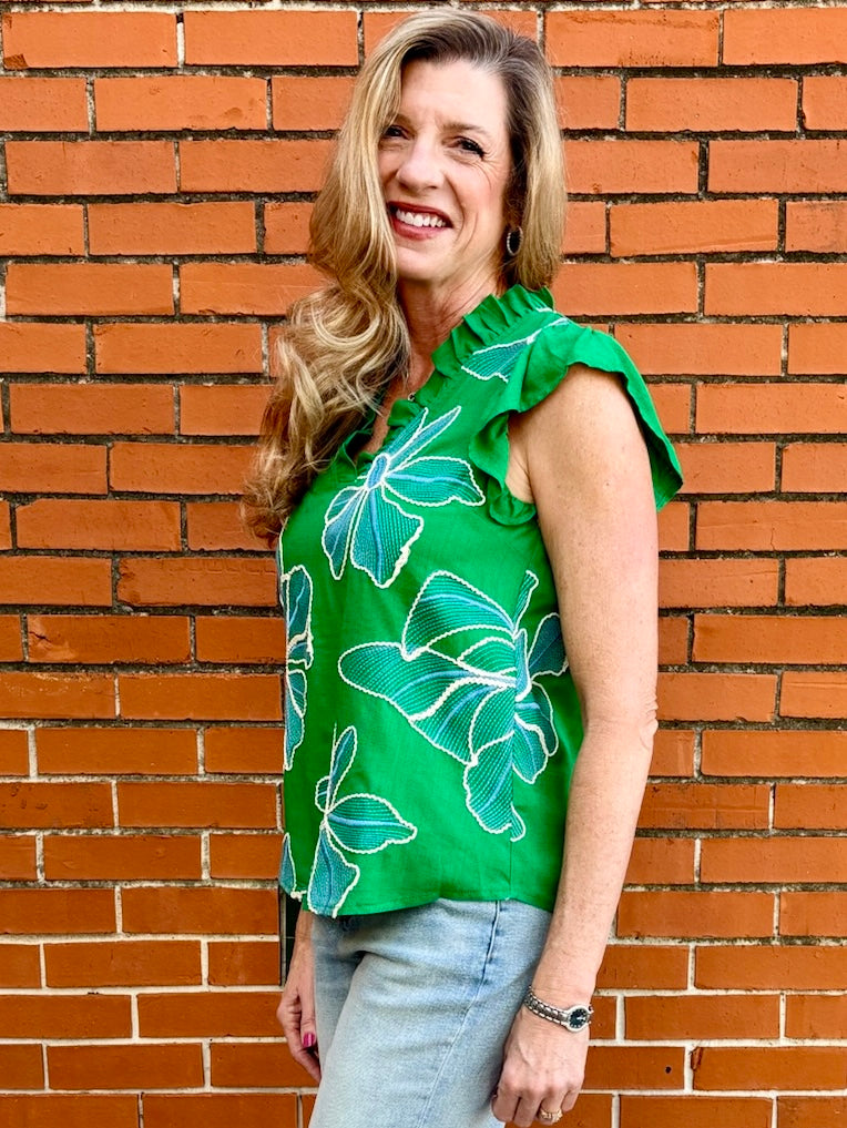Floral embroidered top, green ruffle blouse, V-neck summer top, women's boho clothing, embroidered floral shirt, ruffle sleeve top, woven summer blouse.
ooh la la! in Grapevine TX 76051