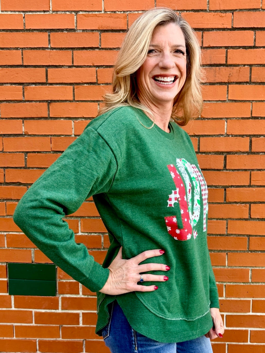 Christmas Joy Quilted Applique Rounded Bottom Sweatshirt in green at ooh la la! in Grapevine TX 76051