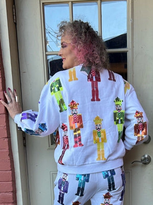Queen of Sparkles White & Rainbow Scatter Nutcracker Sweatshirt at ooh la la! in Grapevine TX 76051