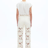 off white floral cutout jeans, embroidered straight leg pants, women's cream denim, high rise relaxed jeans, boho lace pants, luxury embroidered denim, off white floral trousers at ooh la la in Grapevine TX 76051