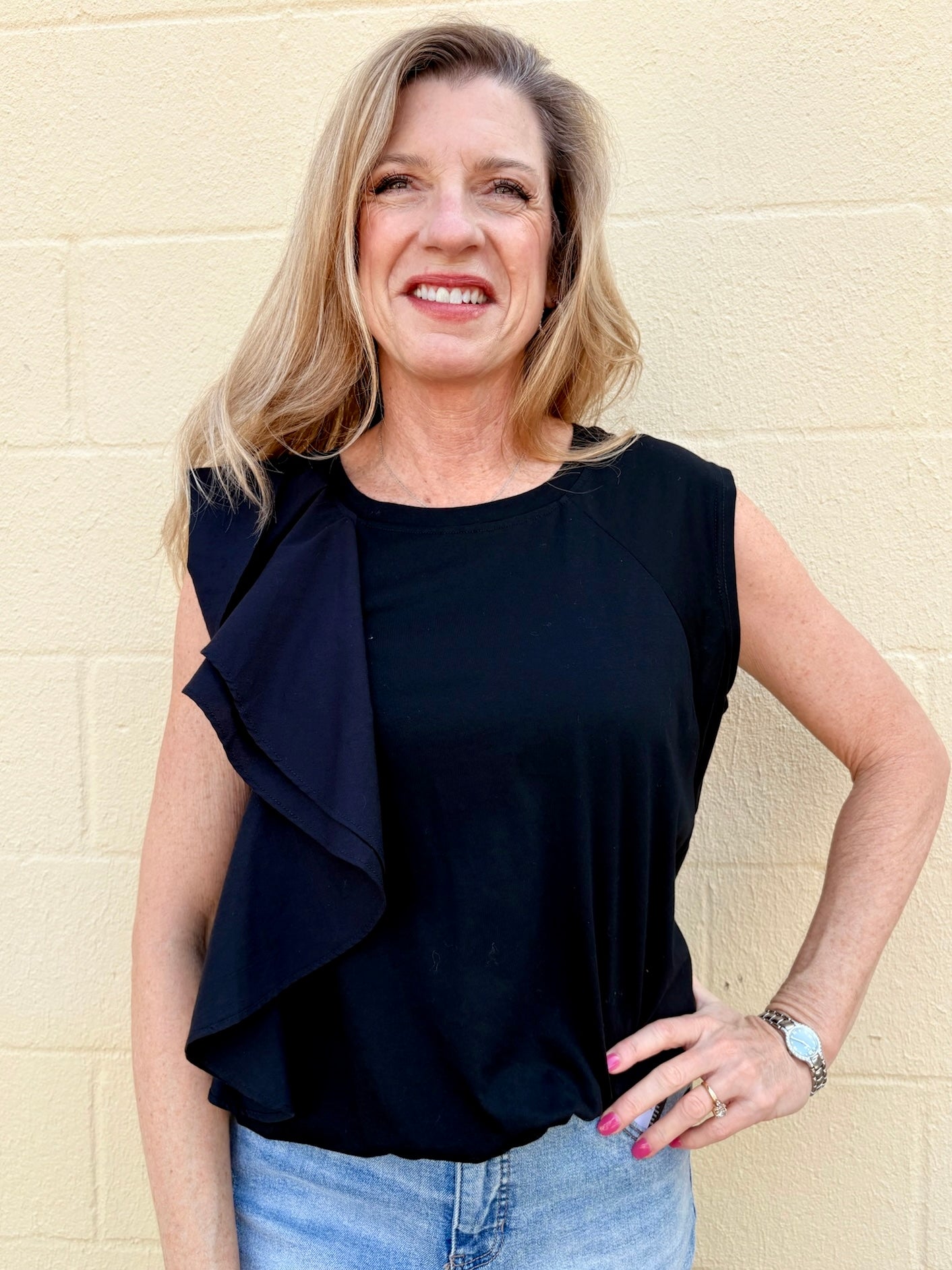 Black Asymmetrical top, ruffle crop top, sporty chic shirt, women's statement top, oversized cropped tee, streetwear fashion, architectural ruffle blouse.
at ooh la la! in Grapevine TX 76051