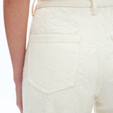 off white floral cutout jeans, embroidered straight leg pants, women's cream denim, high rise relaxed jeans, boho lace pants, luxury embroidered denim, off white floral trousers at ooh la la in Grapevine TX 76051