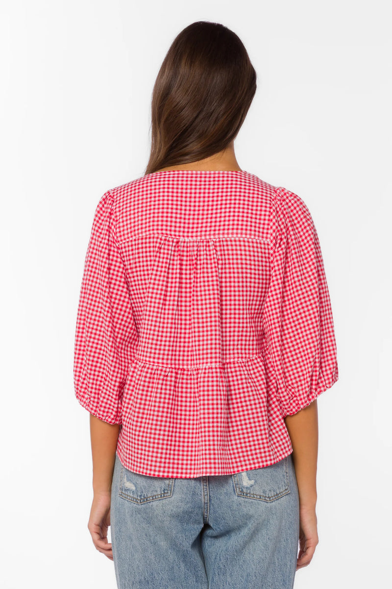 red gingham top, tiered cotton blouse, puff sleeve shirt, cherry red top, v-neck tie blouse, women's summer cotton tops, textured cotton blouse at ooh la la! in Grapevine TX 76051
