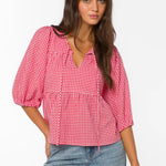 red gingham top, tiered cotton blouse, puff sleeve shirt, cherry red top, v-neck tie blouse, women's summer cotton tops, textured cotton blouse at ooh la la! in Grapevine TX 76051