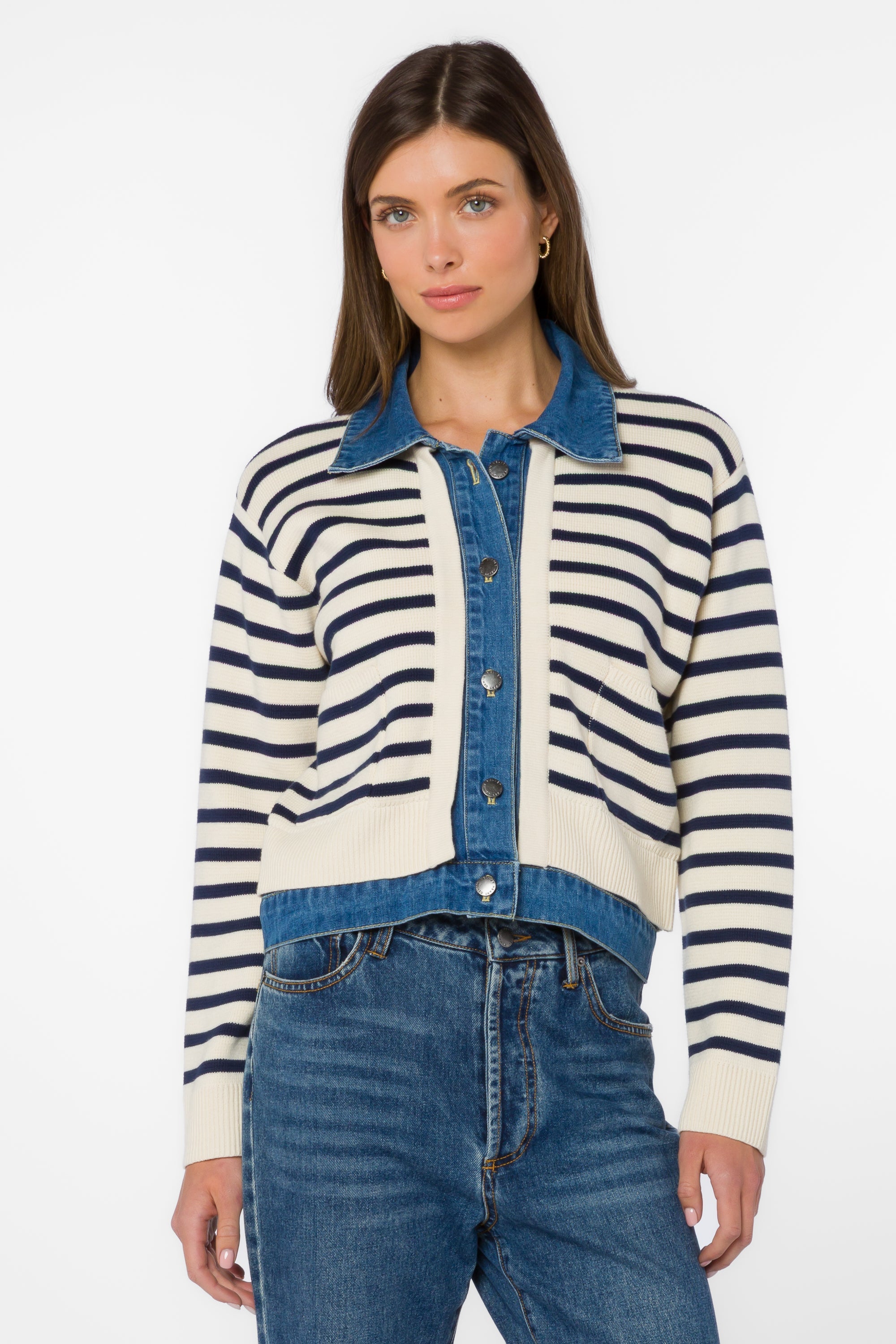 Woman wearing striped cardigan jacket with denim collar in ivory and blue