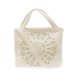 Joy Susan Flora Laser Cutout Crossbody Tote in White at ooh la la! in Grapevine TX 76051