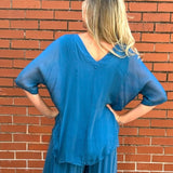 Made in Italy VNeck Silk Tunic with Ruffle Hem in Teal at ooh la la! in Grapevine TX 76051