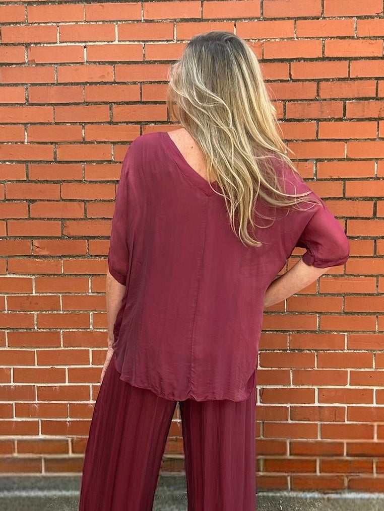 Made in Italy VNeck Silk Tunic with Ruffle Hem in Burgundy at ooh la la! in Grapevine TX 76051