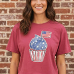 Americana crop top, vintage wash tee, cupcake graphic t-shirt, 4th of July outfit, women's cropped shirt, patriotic summer apparel, nostalgic fashion, red white and blue top. at ooh la la in Grapevine TX 76051