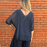 Made in Italy VNeck Silk Tunic with Ruffle Hem in Navy at ooh la la! in Grapevine TX 76051