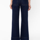 Velvet Heart Gia dark blue wide-leg jeans with leather trim, back view on model
