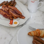 Nora Fleming Mini: wakey wakey (eggs and bacon) at ooh la la! in Grapevine TX 76051