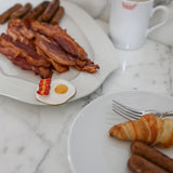 Nora Fleming Mini: wakey wakey (eggs and bacon) at ooh la la! in Grapevine TX 76051