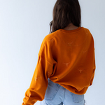 Texas Longhorns Repeat Logo Lantern Sleeve Sweatshirt at ooh la la! in Grapevine TX 76051