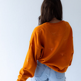 Texas Longhorns Repeat Logo Lantern Sleeve Sweatshirt at ooh la la! in Grapevine TX 76051