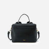 Vegan leather crossbody in black, bow satchel bag, designer vegan handbags, women's spring purses, bow front handbag, gold hardware crossbody, eco-friendly satchel, Zoey bag.
ooh la la! in Grapevine TX 76051