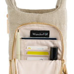 WanderFull HydroBag interior showing organized pockets with cards, pen, and lipstick