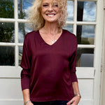 Satin Long Sleeve V-Neck Blouse In wine at ooh la la! In Grapevine TX 76051