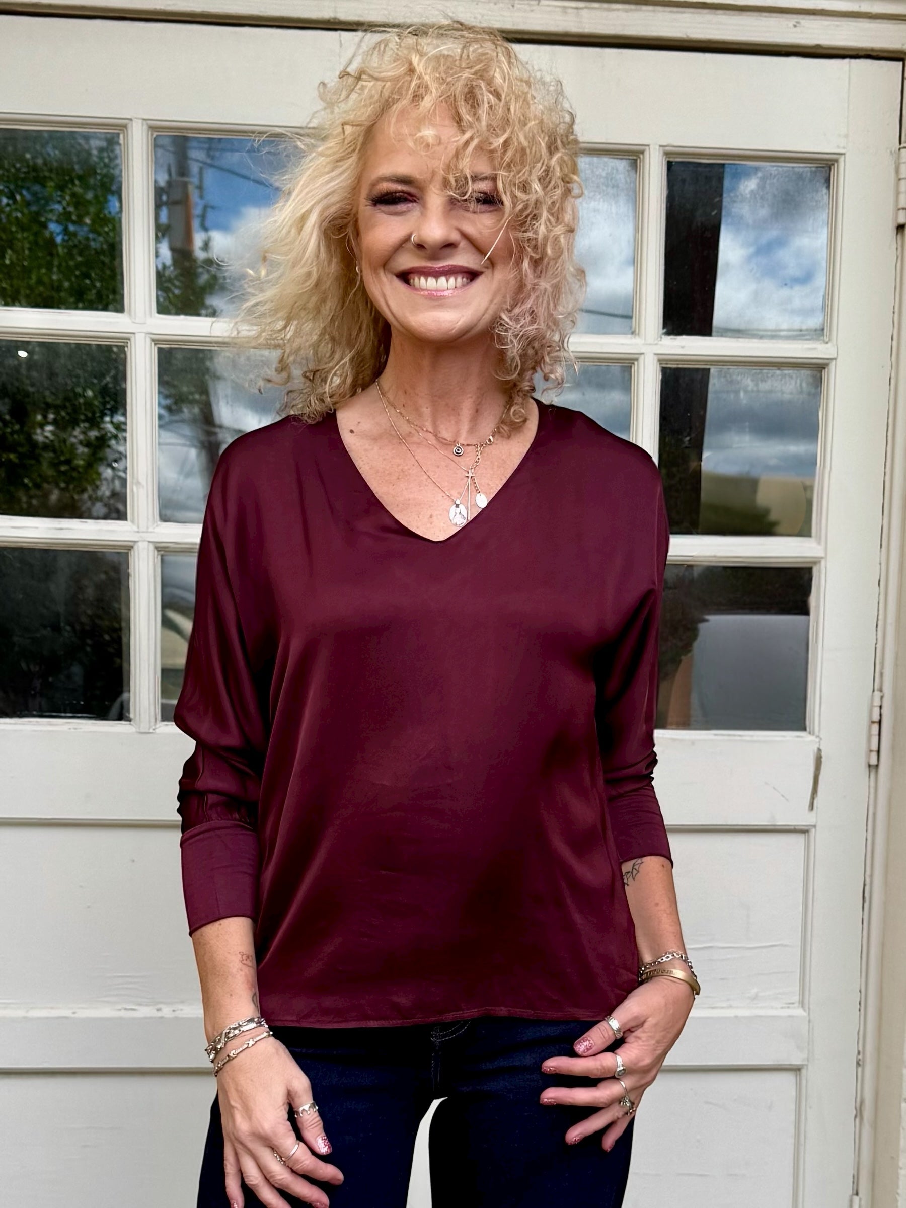 Satin Long Sleeve V-Neck Blouse In wine at ooh la la! In Grapevine TX 76051
