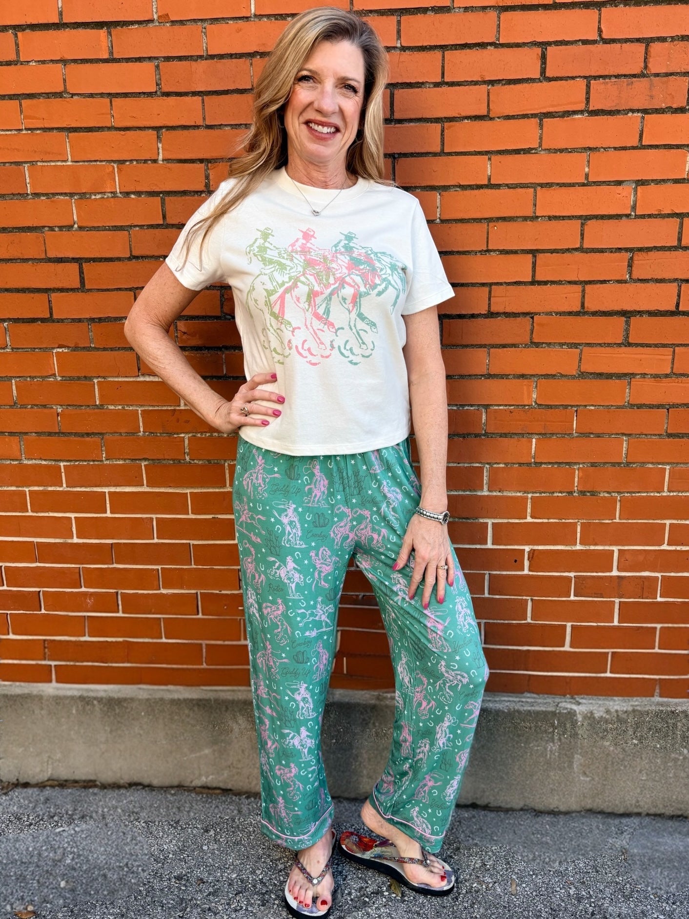 Western pajamas, rodeo print loungewear, soft pajama pants, cowgirl sleepwear, sage green pajamas, unisex pajama bottoms, boho western wear, rodeo lounge pants
at ooh la la! in Grapevine TX 76051