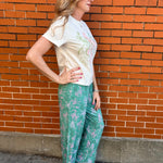 Western pajamas, rodeo print loungewear, soft pajama pants, cowgirl sleepwear, sage green pajamas, unisex pajama bottoms, boho western wear, rodeo lounge pants
at ooh la la! in Grapevine TX 76051