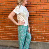 Western pajamas, rodeo print loungewear, soft pajama pants, cowgirl sleepwear, sage green pajamas, unisex pajama bottoms, boho western wear, rodeo lounge pants
at ooh la la! in Grapevine TX 76051