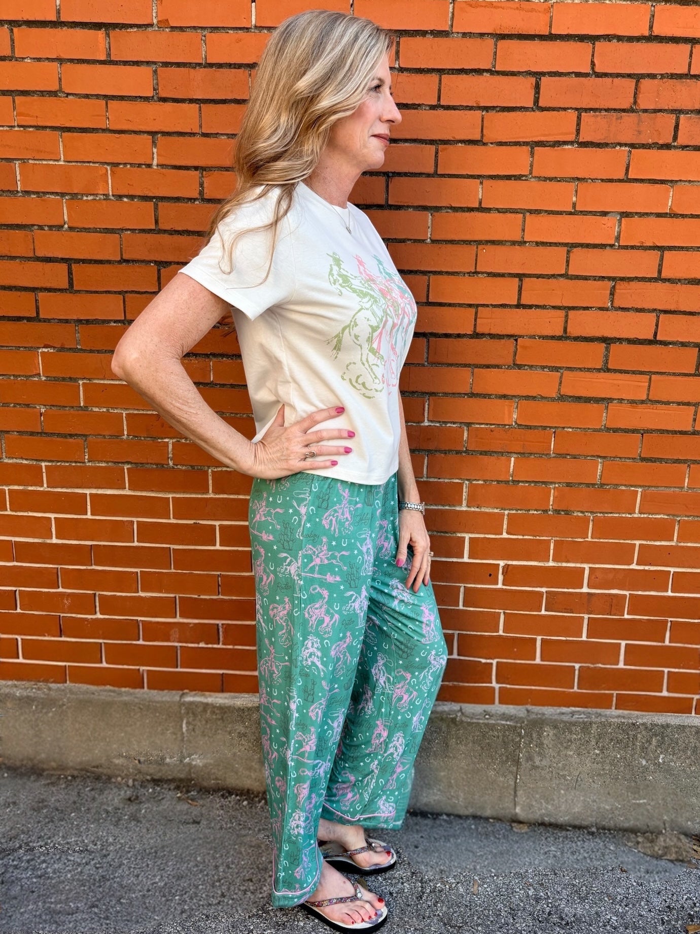 Western pajamas, rodeo print loungewear, soft pajama pants, cowgirl sleepwear, sage green pajamas, unisex pajama bottoms, boho western wear, rodeo lounge pants
at ooh la la! in Grapevine TX 76051